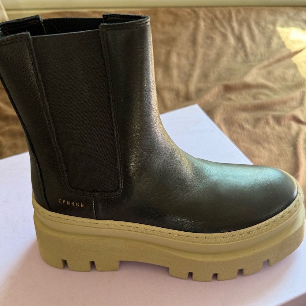 Sleek Black and Cream Heeled Boots